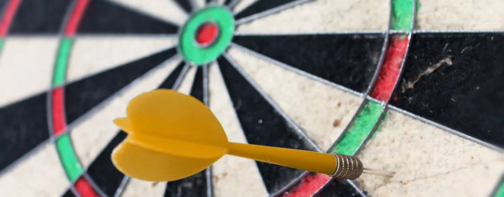 image of a dart that has been thrown at a target and completely missed, analogy of bad marketing data can make you miss the target